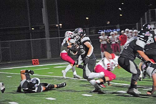 Justin Sero runs in a 16-yard touchdown in the fourth quarter against Medford Friday, Sept. 20 at IncredibleBank Field in Minocqua. (Photo by Brett LaBore/Lakeland Times)