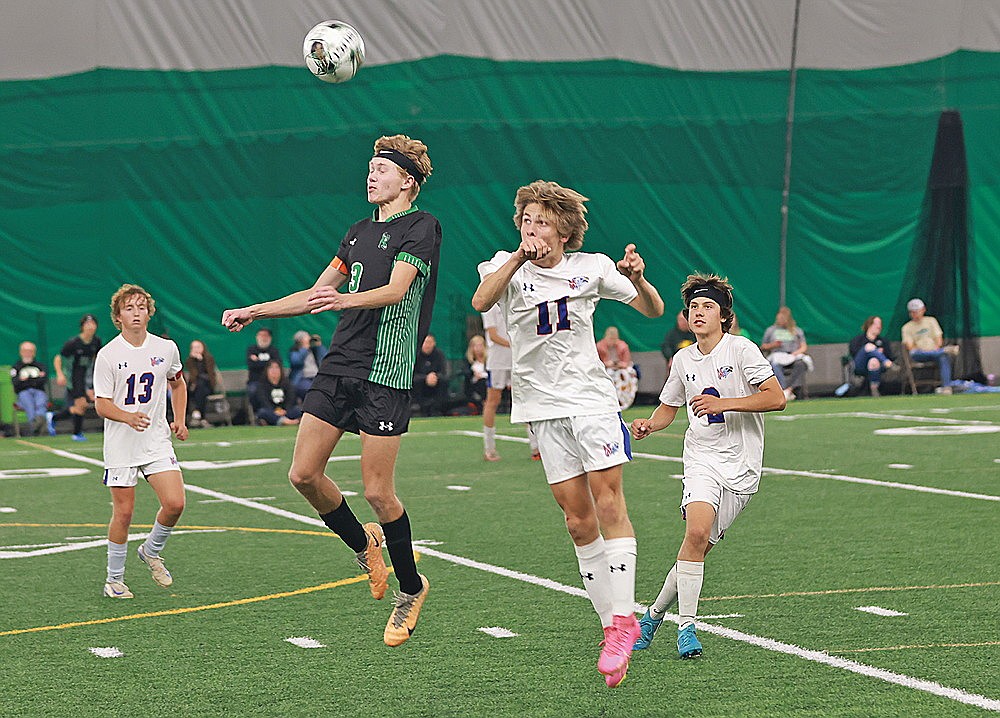 Rhinelander’s Hart Hokens heads the ball in front of Northland Pines’s Dechlan Favorite during the second half of a GNC boys’ soccer game in the Hodag Dome Thursday, Sept. 19. Hokens scored Rhinelander’s lone goal in a 6-1 loss to the Eagles. (Bob Mainhardt for the River News)