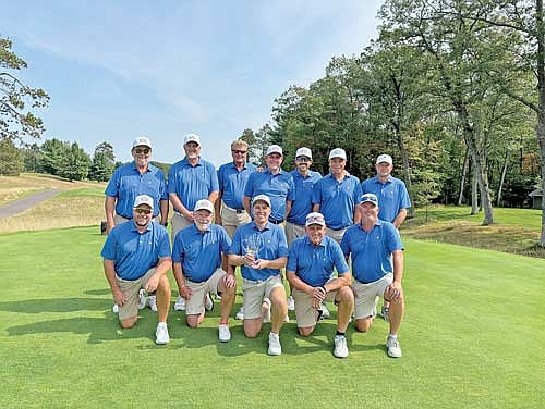 Team Minocqua Country Club pictured, back row from left, are Guy Roe, Peter Nomm, Bob Omelina, Dave Kemnitz, Garth Gilster, John Johannes, Jason Rowe; front row, Jay Royle, John Hogan, Matt Kock, Jerry Brauneis and John Sylla. (Contributed photograph)