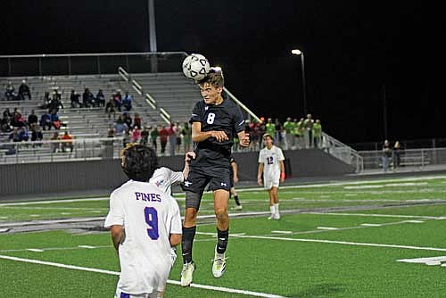 Ethan Seeliger rises for a header in the second half against Northland Pines Thursday, Sept. 26 at IncredibleBank Field in Minocqua. (Photo by Brett LaBore/Lakeland Times)