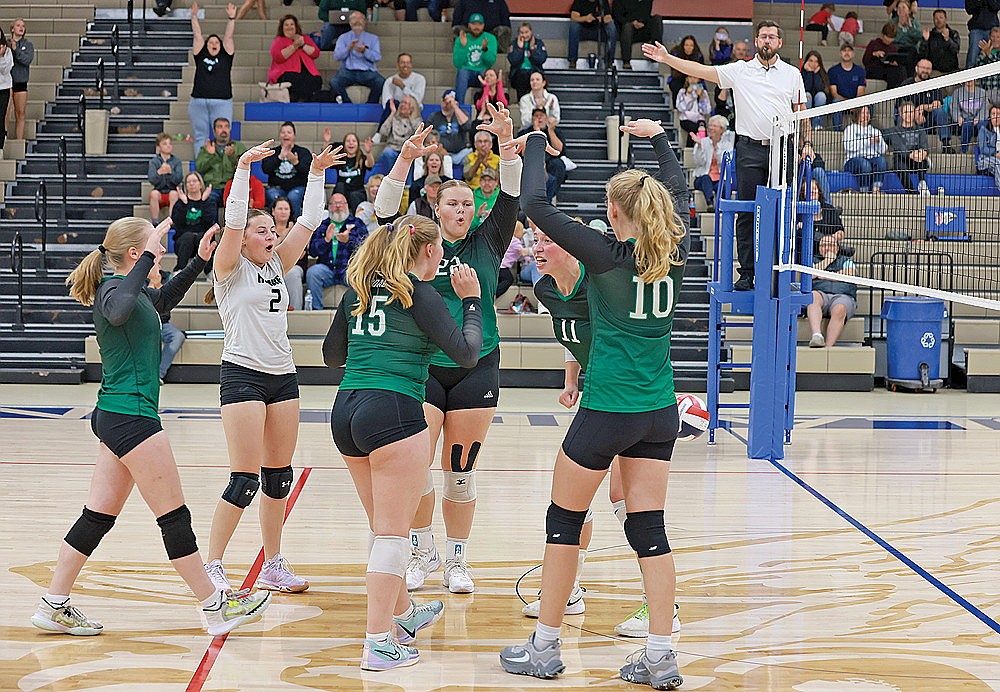 The Rhinelander High School volleyball team reacts after Kelsi Beran records a kill late in the first set of a GNC volleyball match against Northland Pines High School in Eagle River Tuesday, Oct. 1. The Hodags defeated the Eagles in four sets, marking the first time since 2017 that Rhinelander has won multiple GNC matches in a season. (Bob Mainhardt for the River News)