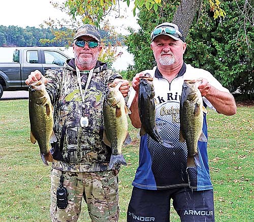 Wayne Dezotell (right) and Rex Hilgart won the 2024 Rod Gaskill Memorial Bass Tournament with 18.90 pounds. (Photo by Beckie Gaskill/Lakeland Times)