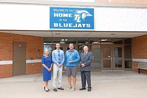 The Nicolet College Foundation recently presented its 2024 Friends and Partners Award to the Three Lakes School District. Pictured are, from left to right, Nicolet College President Kate Ferrel, Three Lakes School District 7th-12th Grade Counselor Ryan Bock, Three Lakes High School Principal Justin Szews, and Nicolet College Foundation Board President John Schiek. (Submitted photo)