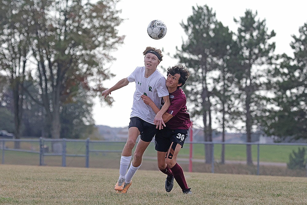 Rhinelander’s Hart Hokens is grabbed by Antigo’s Ezra Santiago during the first half of a GNC boys’ soccer match in Antigo Thursday, Oct. 3. The Hodags fell to the Red Robins, 1-0. Rhinelander had not lost to Antigo dating back to 2003 — as far back as online records are available. (Jeremy Mayo/River News)