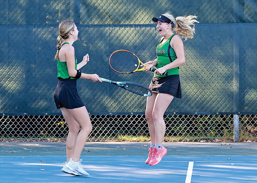 Rhinelander’s Evelyn Sawyer, right, and Maya Patrick react after winning a match tiebreaker over Medford’s Lily Holmes and Hayley Metz in a WIAA Division 1 subsectional tournament at the RHS tennis courts Monday, Oct. 7. The victory advances Sawyer and Patrick, a pair of seniors, on to the sectional round of the WIAA tournament, which took place Wednesday in Eau Claire. (Bob Mainhardt for the River News)