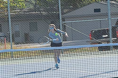 Sierra Wallace runs up for a groundstroke in her No. 3 singles match against Pacelli during a WIAA Division 2 subsectional meet Monday, Oct. 7 at the Lakeland Union High School tennis courts in Minocqua. (Photo by Brett LaBore/Lakeland Times)