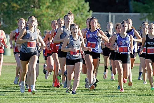 The Lakeland girls take off from the start line during the Northland Pines Invite Tuesday, Oct. 8 at Northland Pines High School in Eagle River. Thunderbirds pictured, from left, are Stella Meza, Sherri Handeland and Ada Ernst. (Photo by Jeremy Mayo/River News)