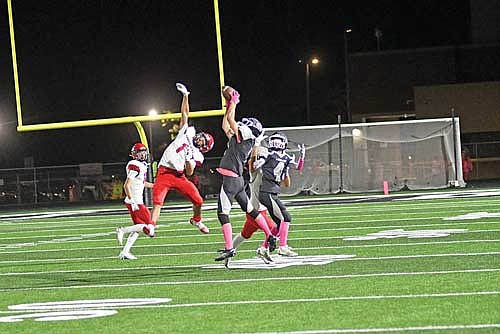 Mitch Mleko makes a 34-yard catch against the defense of Wausau East’s Jalon Bailey in the first quarter Friday, Oct. 11 at IncredibleBank Field in Minocqua. (Photo by Brett LaBore/Lakeland Times)