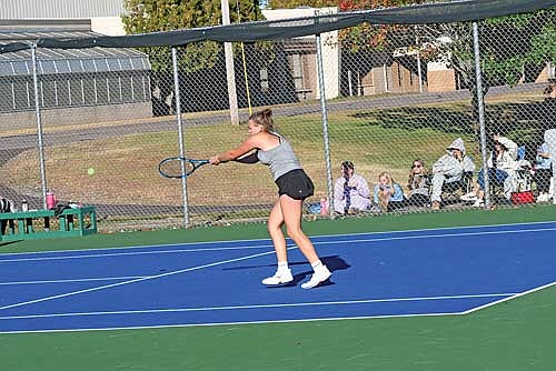 Sarah Barton sends the ball back in her No. 1 singles final against Baldwin-Woodville’s Maggie Jensen at a WIAA Division 2 sectional meet Wednesday, Oct. 9 at the Lakeland Union High School tennis courts in Minocqua. (Photo by Brett LaBore/Lakeland Times)