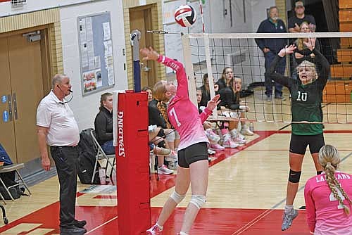 Lexi Gindorff attacks the ball against Rhinelander during the second Great Northern Conference Meet Saturday, Oct. 12 at Medford Area Middle School. (Photo by Brett LaBore/Lakeland Times)