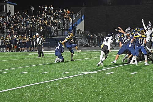 The Thunderbirds block the extra-point attempt of Tomahawk’s Walter Horabik in the fourth quarter of a 7-6 win Friday, Oct. 18 at Hatchet Field in Tomahawk. (Photo by Brett LaBore/Lakeland Times)