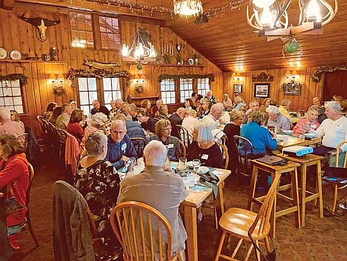 In celebration of the 10th anniversary of Fe University, 85 students, teachers and friends gathered at Manitowish Waters’ Little Bohemia Lodge on Oct. 10. There they enjoyed a fine meal and an intriguing presentation, Kay Krans’ “Gangsters of the Northwoods.” (Contributed photograph)