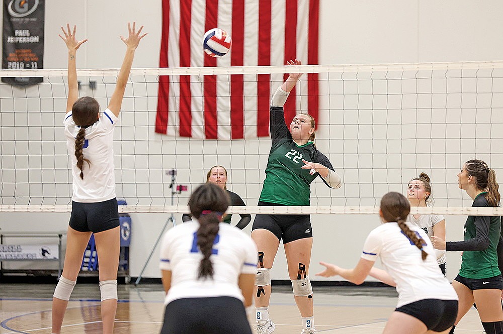 Rhinelander’s Libbey Buchmann puts up a shot against Merrill’s Grace Reimann during the second set of a WIAA Division 2 regional quarterfinal volleyball match in Merrill Tuesday, Oct. 22. Buchmann recorded a team-high eight kills and 17 digs, but the Hodags fell to the Bluejays in three sets. (Bob Mainhardt for the River News)