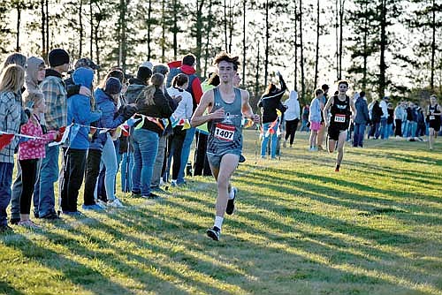 Ashton Bremer runs the final stretch of a WIAA Division 2 sectional meet Friday, Oct. 25 at Colby High School. Bremer qualified for the state meet for the fourth time in his career. (Photo by Azael Meza for the Lakeland Times)