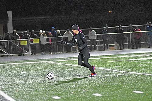 Jack Stepec runs up to make a penalty kick in a WIAA Division 3 sectional semifinal game against Shawano Thursday, Oct. 31 at IncredibleBank Field in Minocqua. Stepec converted his penalty kick chance, but the T-Birds lost a shootout to the Hawks, 5-4, after the sides played to a 1-1 draw following 100 minutes of soccer. (Photo by Brett LaBore/Lakeland Times)