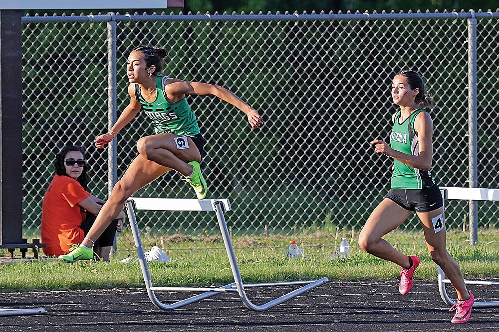 In this May 23, 2024 file photos, Rhinelander’s Aila Bergman competes in the 300-meter hurdles during a WIAA Division 2 sectional track meet in Colby. The WIAA announced last week that, beginning in 2025, it would include individuals and relays teams that did not automatically qualify for the state meet through sectionals but had one of the top 10 performances in all sectionals combined. That number had previously been eighth and Bergman missed out on a spot at state in the 300-meter hurdles last spring by 0.02 seconds with the ninth-best mark in Division 2. (Jeremy Mayo/River News)