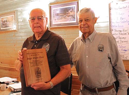 Lumberjack RC&D past president Wayne Plant (left) accepted the Outstanding Service Award from Lumberjack president Larry Sommer. The award recognized Plant’s decades of service to Lumberjack and to the organizations and communities under its umbrella. (Photo by Beckie Gaskill/Lakeland Times)