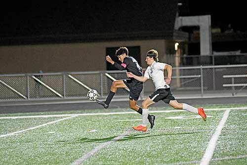 In this Oct. 3, 2024 file photo, Dominic Gironella leaps to make a play on the ball followed by Mosinee’s Aiden Karst at IncredibleBank Field in Minocqua. Gironella was named co-Offensive Player of the Year with Northland Pines’ Cody Vojta. (Photo by Brett LaBore/Lakeland Times)