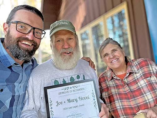 Joe and Mary Hovel with Mike Carlson, Gathering Waters executive director. (Contributed photograph)