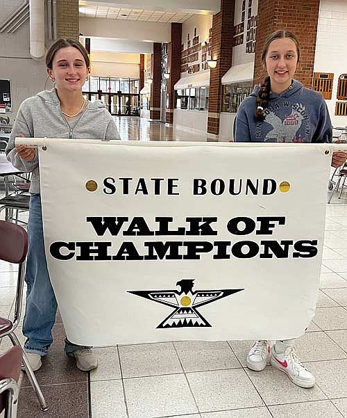 LUHS senior Ada Ernst, left, and AV-W eighth-grader Lauren Thielman are recognized by LUHS prior to performing in their respective state honors concerts. (Contributed photograph)