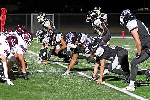 In this Oct. 4, 2024 file photo, the Thunderbirds line up for a play on defense against Antigo at IncredibleBank Field in Minocqua. Team pictured, front row from left, are Nolan Johnson, Carmelo Roche-Vetterneck, Tyrone Moore, Eli Ewald; middle row, Matthew Koplin, Michael Schettino, Tyson Skubal; back row, Sevren LaBarge. (Photo by Brett LaBore/Lakeland Times)