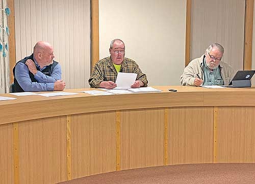 Dennis Pearson, left, the newest town supervisor on the Lac du Flambeau town board, took his seat following his appointment during the town board’s Nov. 6 meeting. Also in the photo is town chairman Matt Gaulke and town supervisor Bob Hanson. (Photo by Brian Jopek/Lakeland Times)