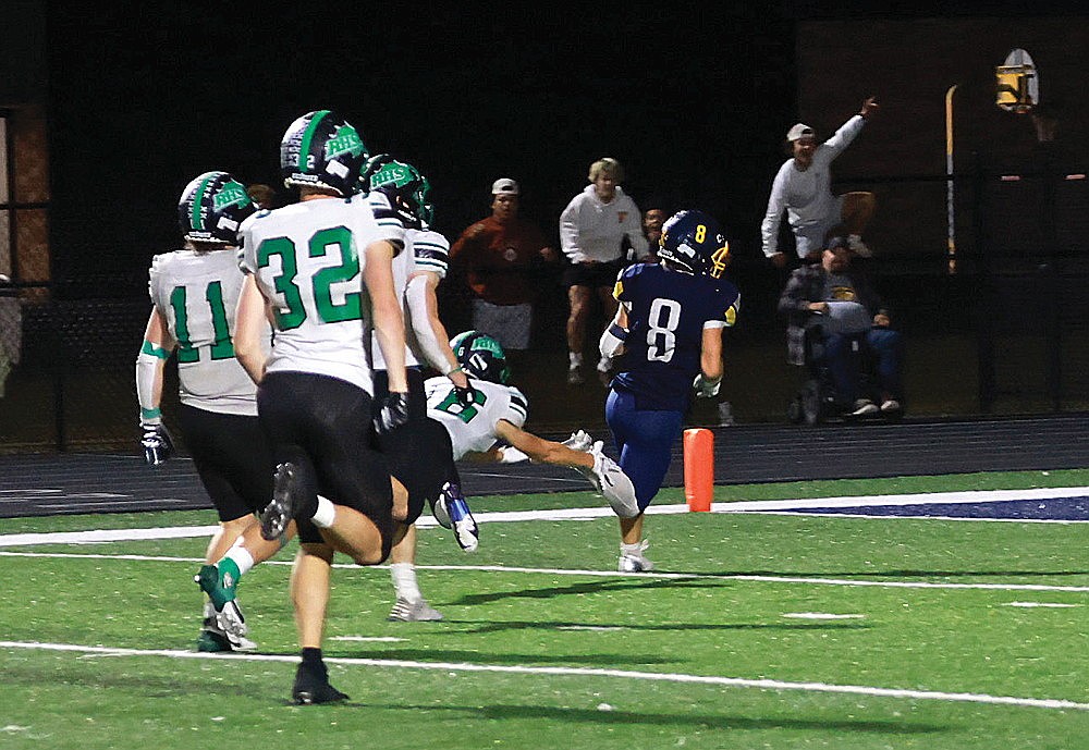 In this Sept. 20, 2024 file photo, Rhinelander’s Rowan Wiczek attempts to tackle Tomahawk’s Landyn Seymour on a fake field goal attempt late in the fourth quarter of a GNC football game at Tomahawk. The Hodags football team went 3-6 on the year with three losses, including a 21-14 defeat at Tomahawk, that were decided by eight points or fewer. (Bob Mainhardt for the River News)