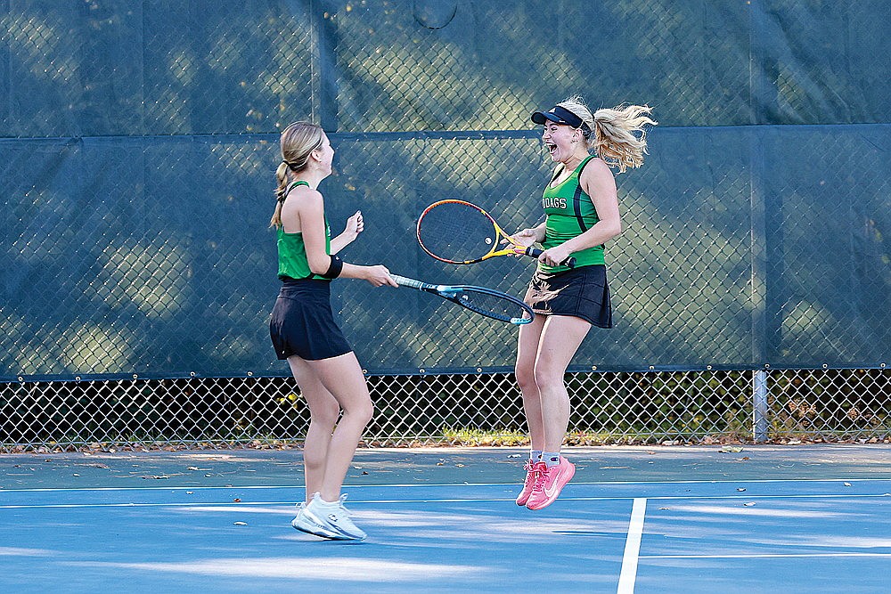 In this Oct. 7, 2024 file photo, Rhinelander’s No. 2 doubles team of Maya Patrick, left, and Evelyn Sawyer reacts after winning a match during a WIAA Division 1 subsectional tennis match at the RHS tennis courts. Patrick led the team with 20 wins on the season as she and Sawyer were Rhinelander’s only two representatives at sectionals. (Bob Mainhardt for the River News)