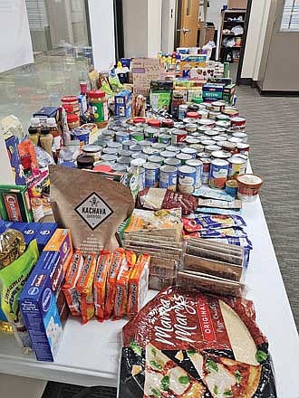 The Rhinelander FBLA/DECA Club collected a total of 538 items for the food pantry during its recent trick-or-can food drive. (Submitted photo)