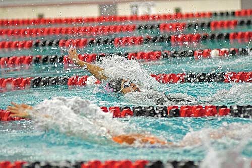 Olivia Mickle swims the 100 backstroke during the WIAA Division 2 state meet Friday, Nov. 15 at Waukesha South Natatorium. Mickle set a new Lakeland school record with a time of 58.82. (Photo by Brett LaBore/Lakeland Times)