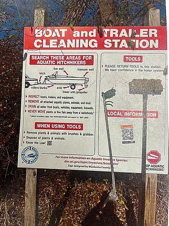 Pictured is an example provided to Lake Tomahawk town board members of the sign and tools the Tomahawk Lake Association is seeking to have installed at the Tomahawk Lake boat landing. (Contributed image)