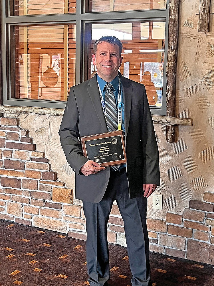 Rhinelander High School activities director Brian Paulson was presented with the Wisconsin Athletic Directors Association District 2 athletic director of the year award during WADA’s annual conference Nov. 10-12 in Wisconsin Dells. (Submitted photo)