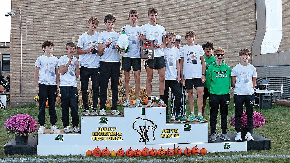 In this Oct. 25, 2024 file photo, the Rhinelander High School boys’ cross country team stands on the podium after finishing second in a WIAA Division 2 sectional in Colby Friday, Oct. 25. The Hodag boys qualified for the WIAA state meet as a team for the second time in four years, the highlight of the squad’s 2024 season. (Bob Mainhardt for the River News)