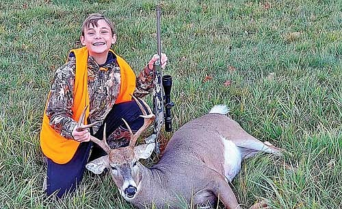 Fourteen-year-old Drake Smudde harvested this 8-point buck on his grandparents’ land with his dad on Sunday, Oct. 6, in Ashland County. (Contributed photograph)