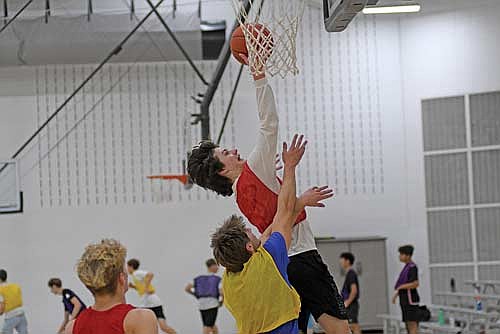 Benny Gahler attempts a layup during practice Monday, Nov. 18 at the Lakeland Union High School fieldhouse in Minocqua. Gahler is taking on an expanded role in 2024-25. (Photo by Brett LaBore/Lakeland Times)