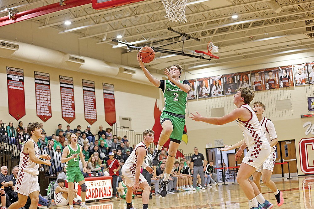 Rhinelander’s Devon Feck drives to the basket during the first half of a non-conference boys’ basketball game at Crandon Tuesday, Nov. 26. Feck scored a game-high 14 points as the Hodags defeated the Cardinals, 74-22. (Bob Mainhardt for the River News)