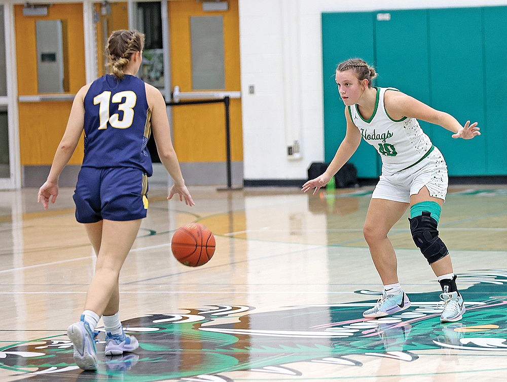 Rhinelander’s Kelsey Winter guards Wausau West’s Paige Anderson during a non-conference girls’ basketball game at the Jim Miazga Community Gymnasium Saturday, Nov. 30. Winter scored in double figures last Friday and Saturday as the Hodags defeated D.C. Everest 39-33 and Wausau west 53-40 in the Tom Kislow Memorial Tournament. (Bob Mainhardt for the River News)