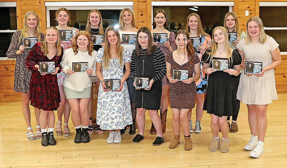 The Rhinelander High School girls’ swim team poses with its awards following its banquet at the Cedric A. Vig Outdoor Classroom Monday, Dec. 2. Pictured in the front row, from left to right, are Lily Thorsen, Millie Gruett, June Chiamulera, Kyleigh Kennedy, Maria Craig, Kyree McMahon and Emma Houg. In the back row are Kiley Pooch, Ellyse Younker, Vivian Lamers, Ella Heck, Celia Francis, Rylee Mickevicius and Jordyn Kecker. (Bob Mainhardt for the River News)