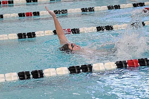 Silas Murray-Fetrow swims the 100 backstroke in a meet against Shawano/Seymour Tuesday, Dec. 3 at the Lakeland Union High School pool in Minocqua. Murray-Fetrow won with a time of 1:22.08. (Photo by Brett LaBore/Lakeland Times)