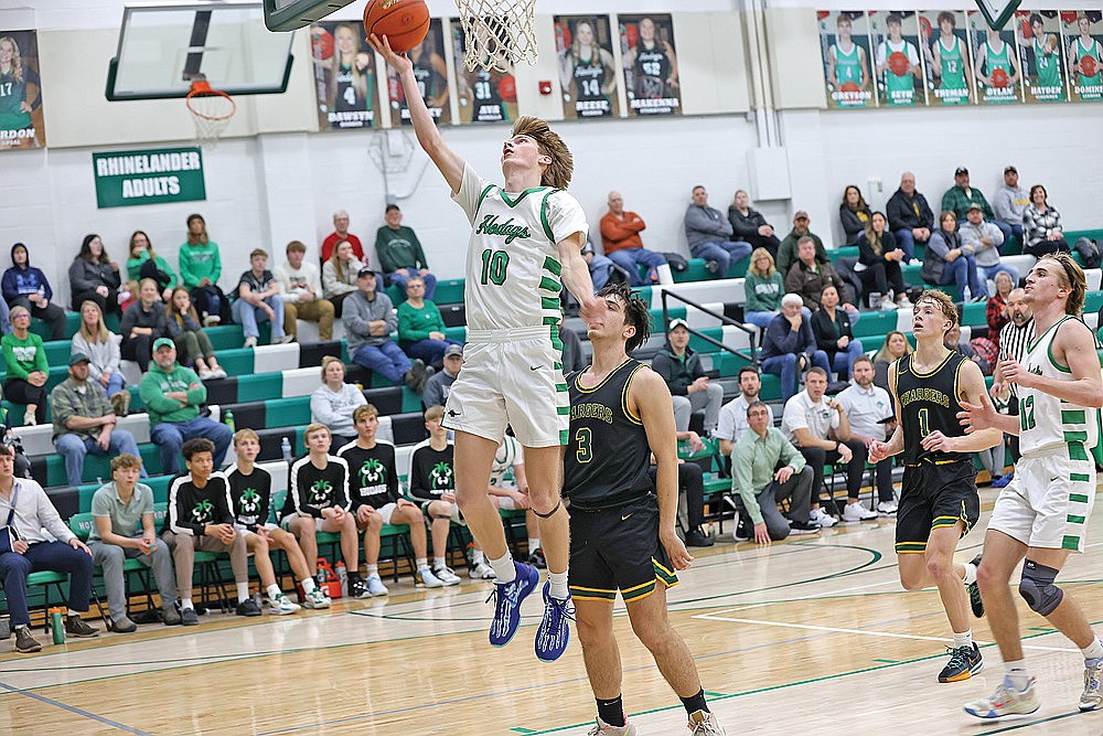 Rhinelander’s Seth Nofftz makes a layup during the second half of a non-conference boys’ basketball game against Wittenberg-Birnamwood at the Jim Miazga Community Gymnasium Tuesday, Dec. 10. Nofftz scored the go-ahead basket with seven seconds remaining in the Hodags 63-59 victory over the Chargers. (Bob Mainhardt for the River News)