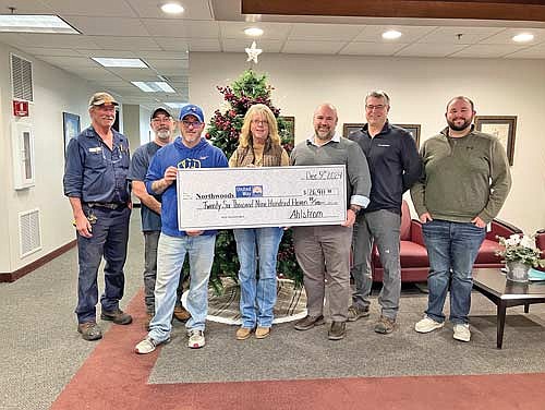 Pictured, from left to right, are Dan Fitz, union representative; John Apfel, Local 2-15 union president; Kevin Larson, Local 2-15 union vice president; Nancy Sattler, Northwoods United Way executive director; Dan McGreaham, Ahlstrom plant manager and Jordan Wolfer, Ahlstrom HR specialist. (Submitted photo)