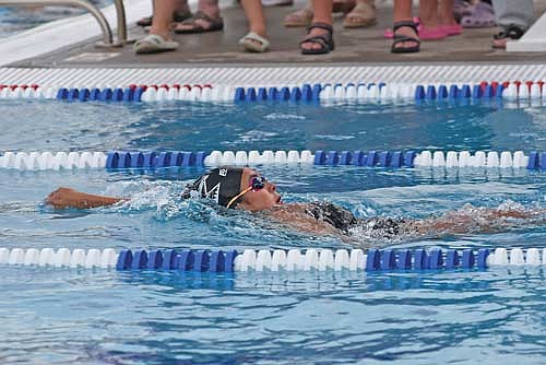 In this Aug. 22, 2024 file photo, Olivia Mickle swims in the Merrill Fun in the Sun Relay Meet at the Bierman Family Aquatic Center. Mickle set two new school records at the end-of-the-season state meet. (Photo by Brett LaBore/Lakeland Times)