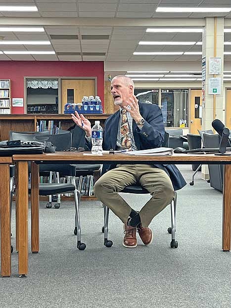 Consultant Patrick Mans of the Wisconsin Association of School Boards helps the board of education create a tentative schedule in its search and hiring process of a new district administrator during a committee of the whole meeting Monday, Dec. 9, in Minocqua. (Photo by Trevor Greene/Lakeland Times)