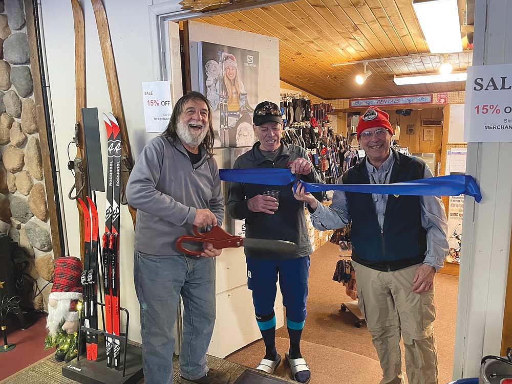 MWP ambassador Joe Sanfilippo prepares to (re)cut the ribbon for the grand opening of the MWP Ski Shop and Ski School new addition. Also pictured are Dan Clausen, center, and Wes Doak. This is Dan’s 43rd season operating the MWP Ski Shop and Ski School. Wes was the original ski shop and ski school operator. (Contributed photograph)