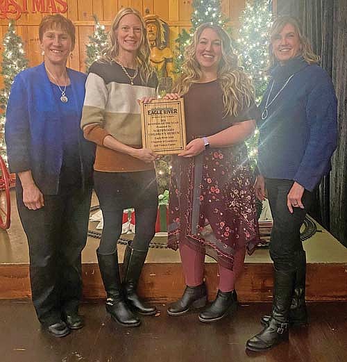 In the photo are Eagle River chamber of commerce executive director Kim Emerson, left, chamber of commerce board member Jackie Weight, Northwoods Children’s Museum director Danielle Larsen and Sue Herfindahl, president of the museum’s board of directors. (Contributed photograph)
