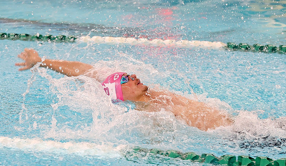 Zacha King, Class of 2024 and current swimmer at UW-Green Bay, competes in the 50-yard backstroke.