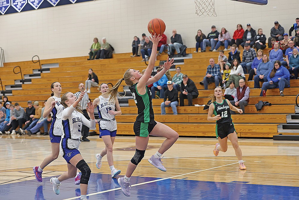 Rhinelander’s Vivian Lamers drives in for a layup during the first half of a non-conference game at Three Lakes Tuesday, Jan. 7. Lamers scored 20 points as the Hodags defeated the Bluejays, 68-37. (Bob Mainhardt for the River News)