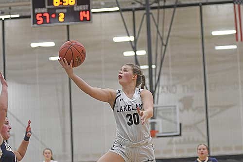 Sophie Wiczek makes a layup in the second half against Tomahawk Tuesday, Jan. 7 at Ted Voigt Court in Minocqua. (Photo by Brett LaBore/Lakeland Times)