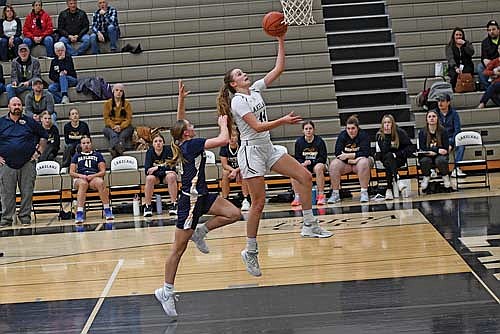 Lakeland’s Kristina Ouimette drives in for a layup during a GNC girls’ basketball game against Tomahawk Jan. 7 in Minocqua. The Hodags will have their hands full against the GNC’s leading scorer tonight as Ouimette comes in averaging over 30 points per game. (Photo by Brett LaBore/Lakeland Times)