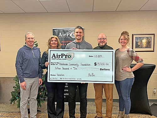 Rhinelander Community Foundation board members Shane Sparks, Gina Heck (president), Hon. Pat O’Melia, and Shannon Campy (treasurer) recently accepted a $15,000 donation to benefit the Hodag Park Improvement Fund. (Submitted photo)